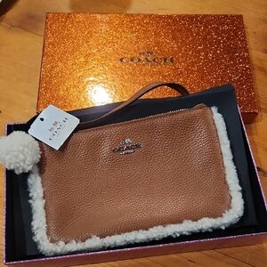 Coach Tan Wristlet with White Shearling Accent